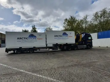 ArcticStore Tropical refrigerated container during transport and on-site installation by TITAN Containers.