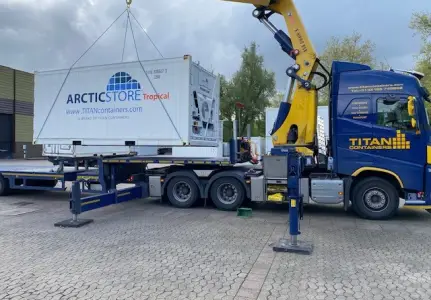 ArcticStore Tropical refrigerated container during transport and on-site installation by TITAN Containers.