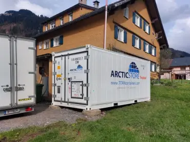 ArcticStore Tropical refrigerated container during transport and on-site installation by TITAN Containers.