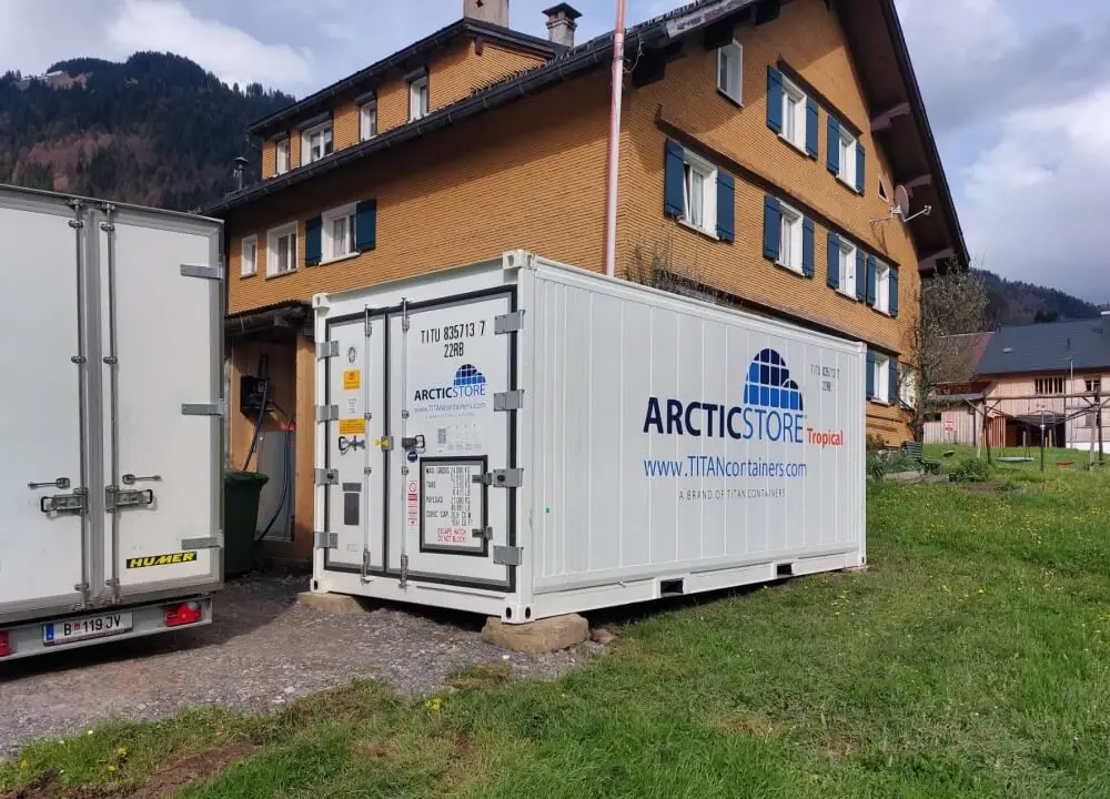 ArcticStore Tropical refrigerated container during transport and on-site installation by TITAN Containers.